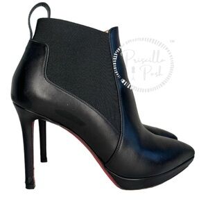 Christian Louboutin Crochinetta 100 heeled ankle boots with a point toe.